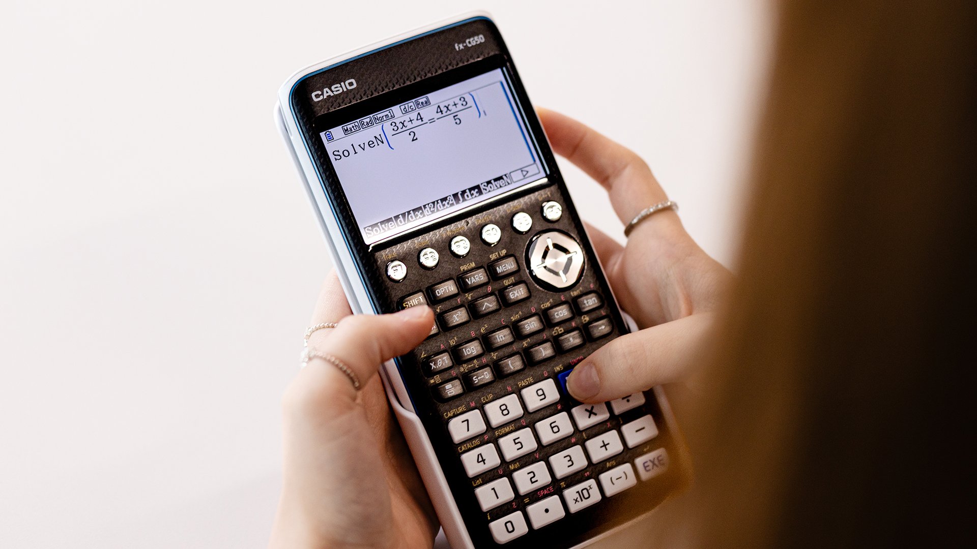 A-Lewel student using the Casio fx-CG50 graphic calculator